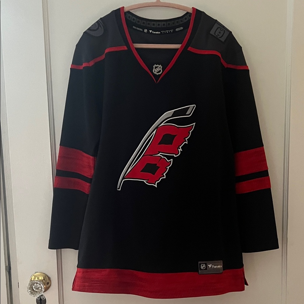 Carolina Hurricanes women’s Fanatics Black and Red Hockey Jersey